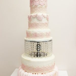 tall white and pink wedding cake