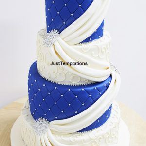 blue and white sashe wedding cake