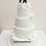 4 tiered white wedding cake