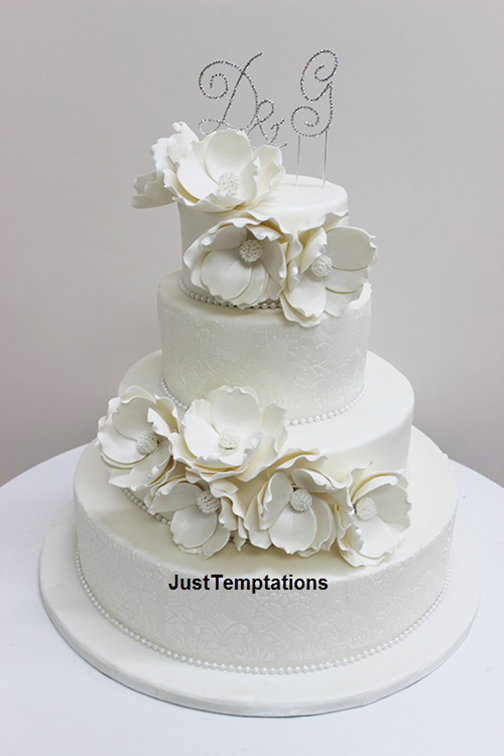 white floral 3 tiered wedding cake