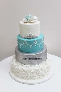4 tiered silver white and teal wedding cake
