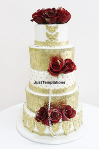 gold and red floral wedding cake