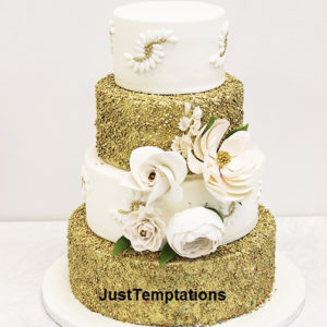 gold confetti and white wedding cake