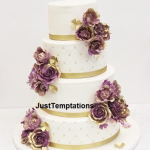 floral wedding cake with gold details