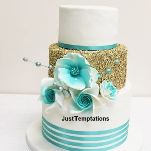 gold confetti and blue wedding cake
