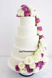 5 tiered pearl white and floral wedding cake