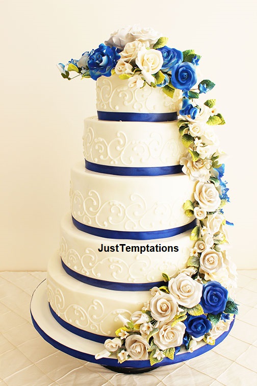 5 tiered white and blue wedding cake
