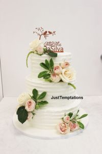 3 tiered butter cream wedding cake