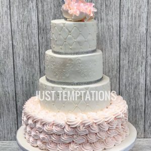 white and pink wedding cake