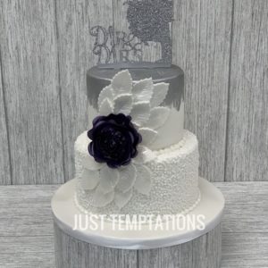 white nad silver wedding cake