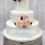 floral white butter cream wedding cake